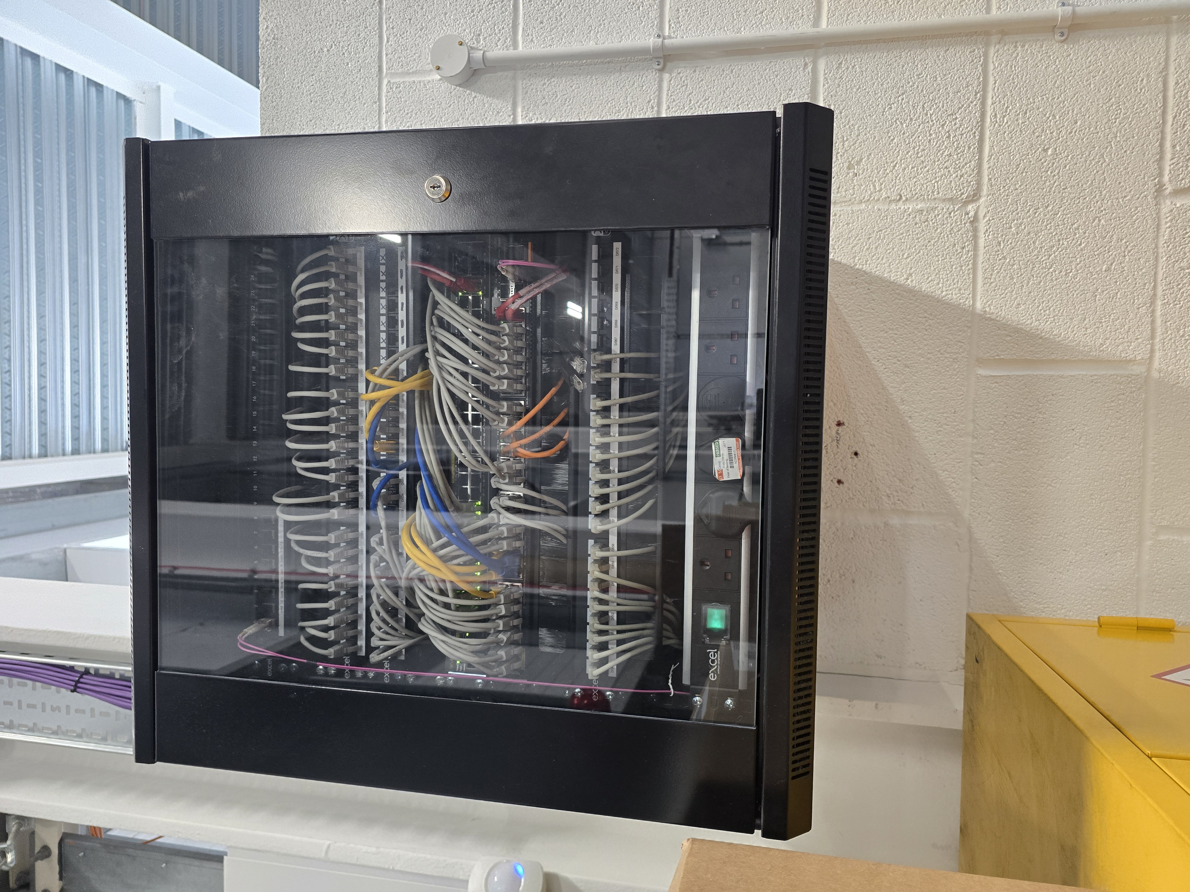 Factory floor network cabinet — installed and commissioned